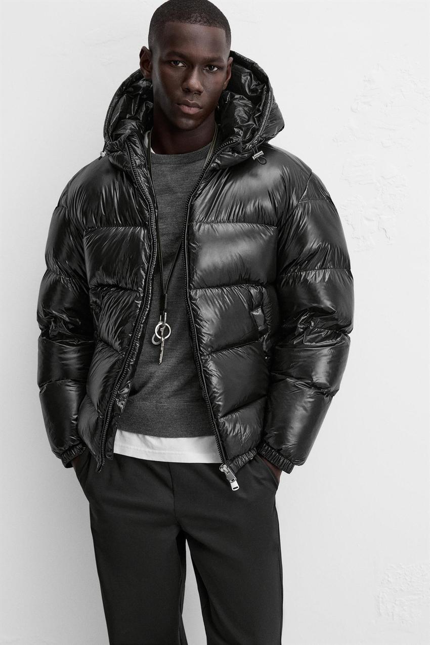 Men's black quilted puffer jacket, side view