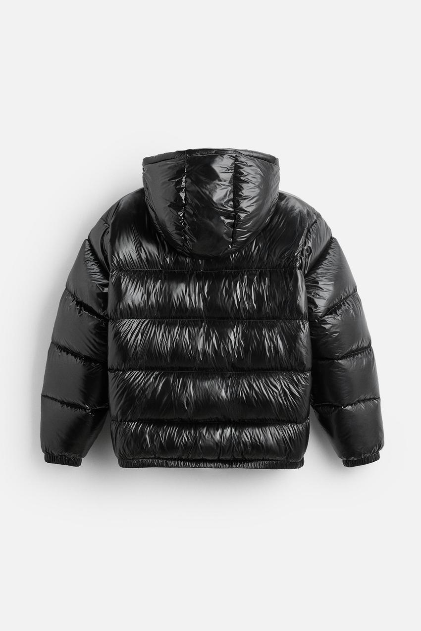 Men's black quilted puffer jacket, back view