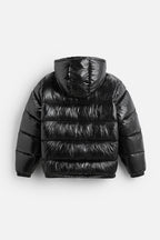 Men's black quilted puffer jacket, back view